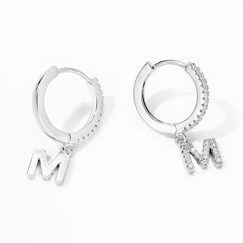 Hoop earrings with initial in 925 sterling silver / 18k gold. Hoop earrings with initial in 925 sterling silver / 18k gold.