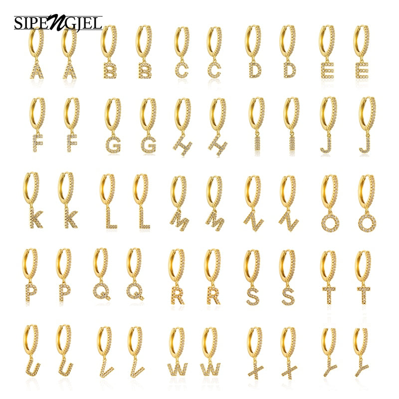 Hoop earrings with initial in 925 sterling silver / 18k gold. Hoop earrings with initial in 925 sterling silver / 18k gold.