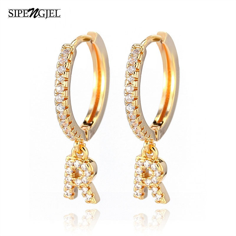 Hoop earrings with initial in 925 sterling silver / 18k gold. Hoop earrings with initial in 925 sterling silver / 18k gold.