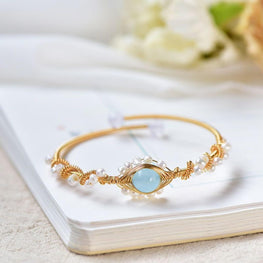 PrimeCrate™ Signature Gold-Braided Pearl Cuff –